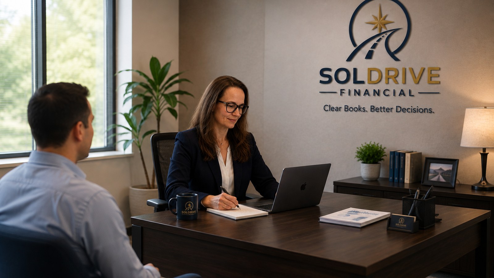 Bookkeeping professional meeting with a small business owner